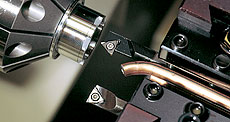 We use gang tool type NC lathe that meets high precision machining of parts